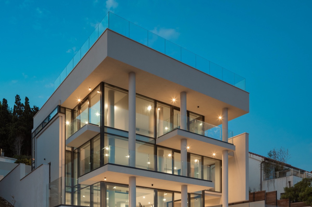 Villa Infinity illuminated at dusk