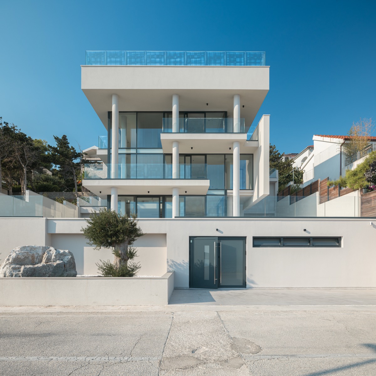 Street elevation with entrance and garage